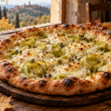 Soffice, filante e dorata: la pizza ai porri porta in tavola tutto il gusto dell’autunno